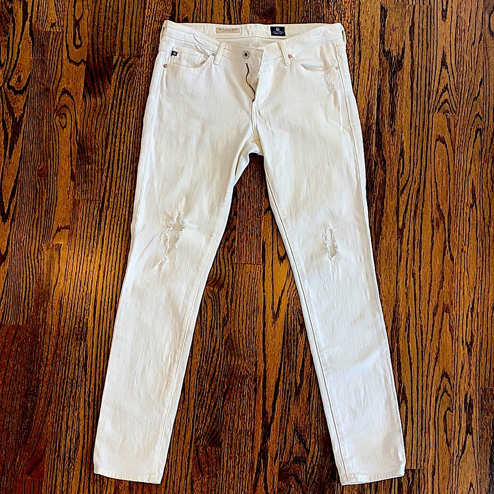 AG White Skinny Jeans with holes in the knees!   Size 28R w/ 28.5-29” inseam.